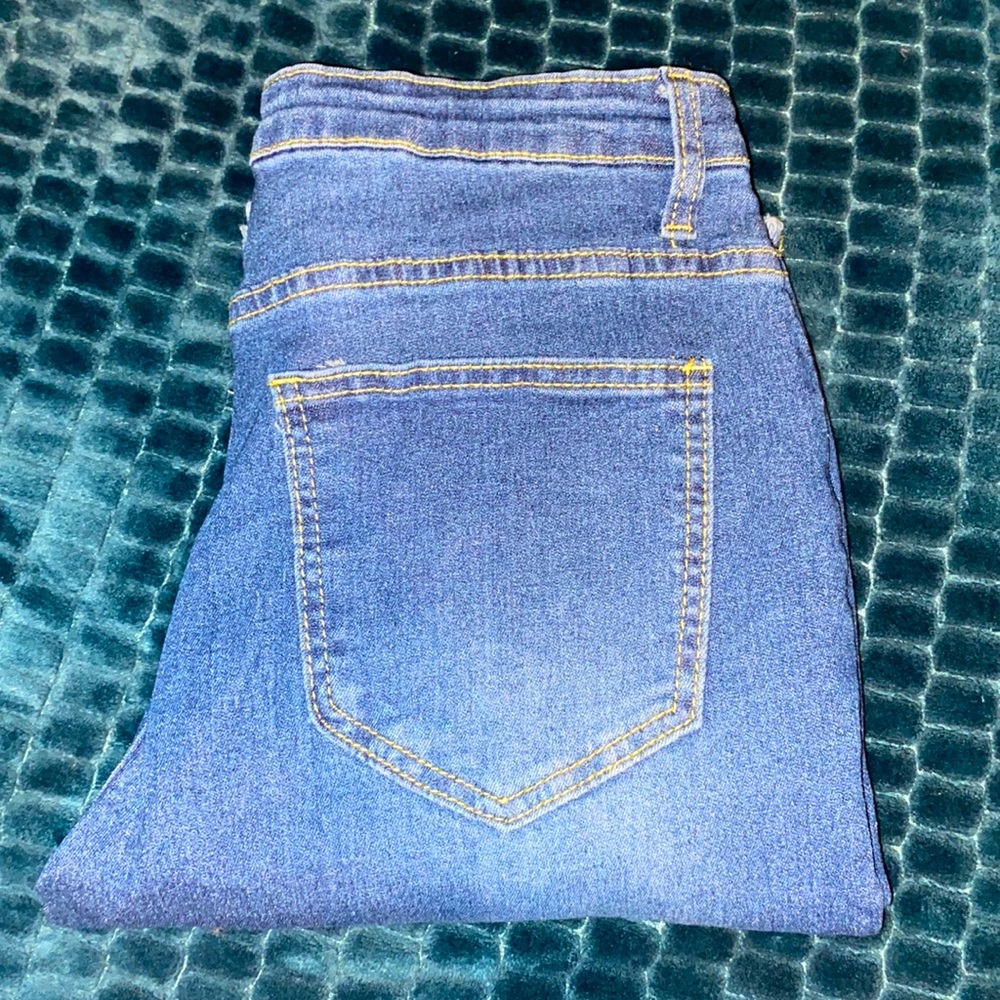Distressed Bell Bottom Jeans